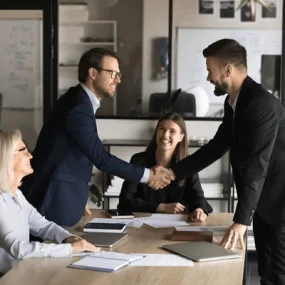 two-happy-confident-business-partners-600nw-2392473747